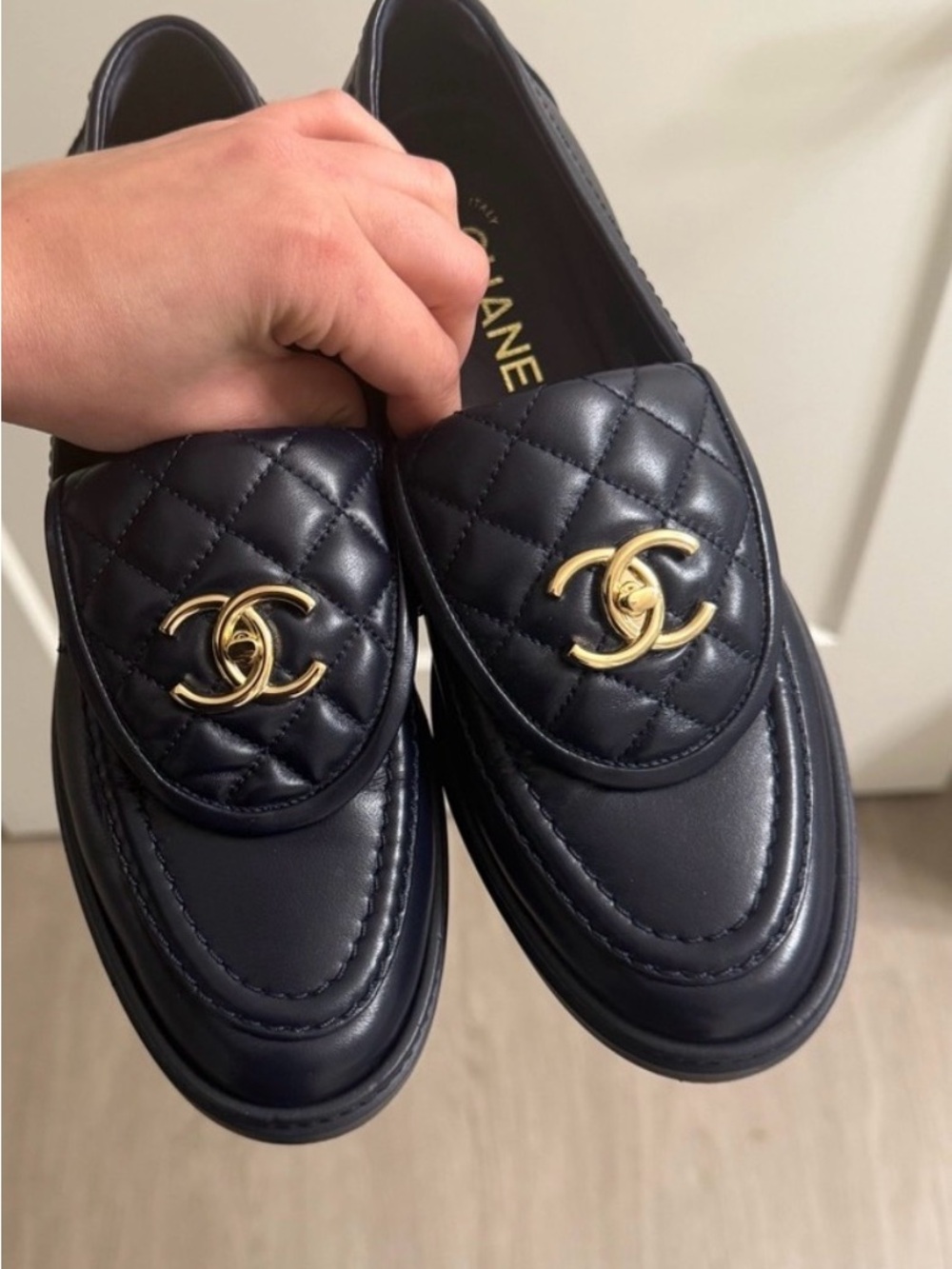 CHANEL Navy Quilted Leather Slip-On Loafers with Gold CC Hardware